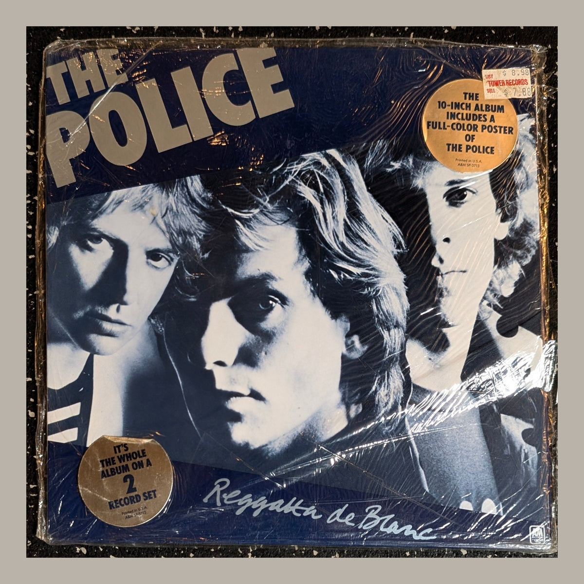 The Police - Reggatta De Blanc, actual copy, front album cover, straight and centered in a matching light frame