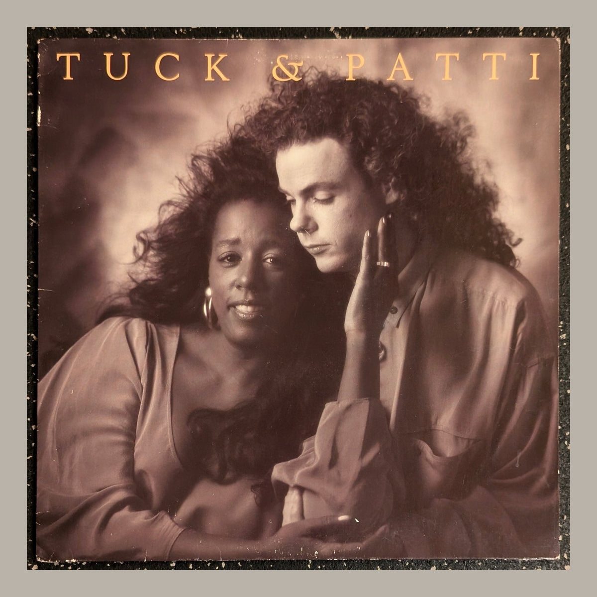 Tuck & Patti - Love Warriors, actual copy, front album cover, straight and centered in a matching light frame