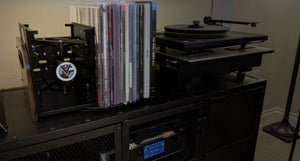 A wide listening-room view of RecordStay, vinyl records, and a turntable.