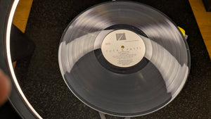 Tuck & Patti — Love Warriors: side one and Windham Hill Jazz label of the actual copy for sale