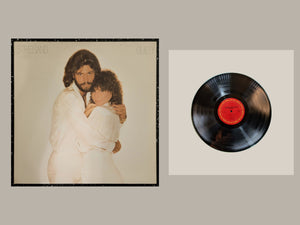 Barbra Streisand - Guilty, actual copy, complete cover and matching full vinyl, straight and centered in a matching light frame
