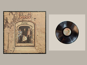 Bread - Manna, actual copy, complete cover and matching full vinyl, straight and centered in a matching light frame