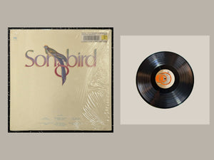 Various Artists - Songbird, actual copy, complete cover and matching full vinyl, straight and centered in a matching light frame